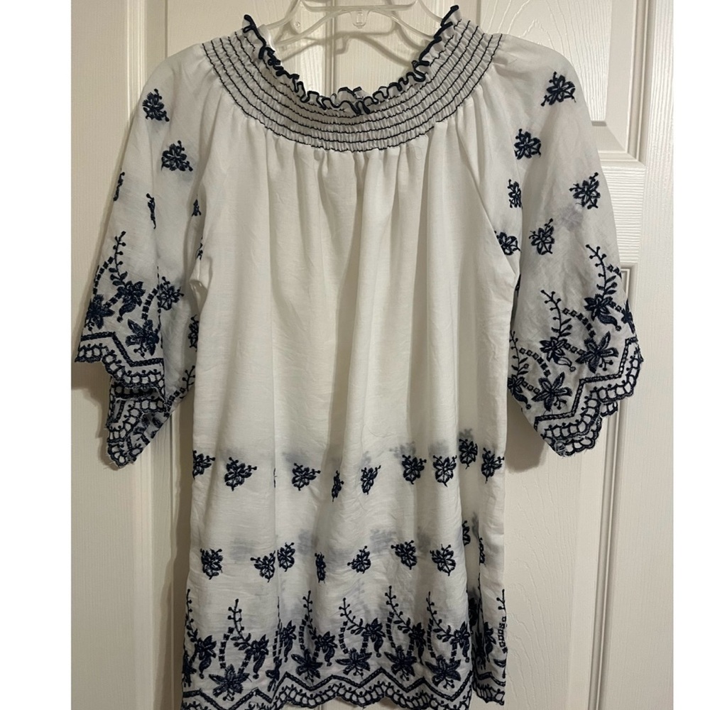 Ladies white blouse with navy detail